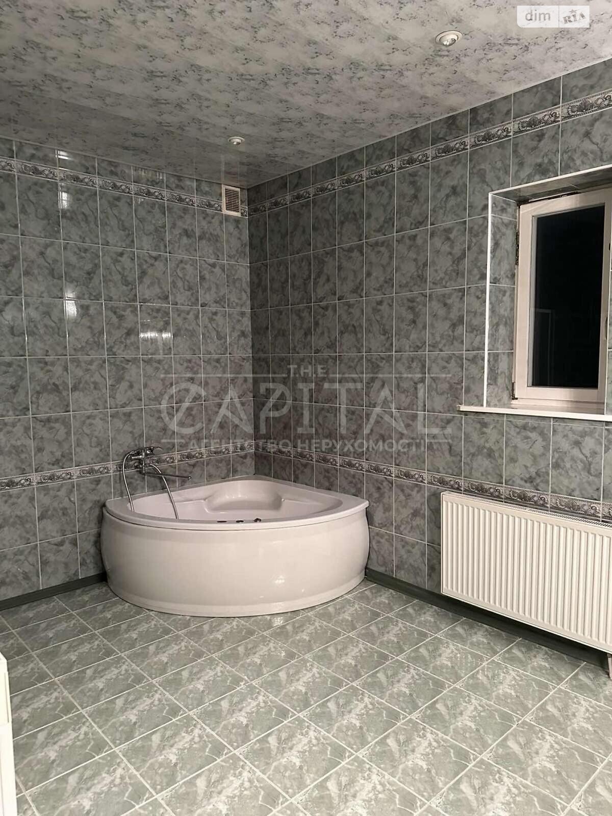 трехэтажный дом с верандой, 428.9 кв. м, кирпич. Продажа в Буче район Буча фото 1