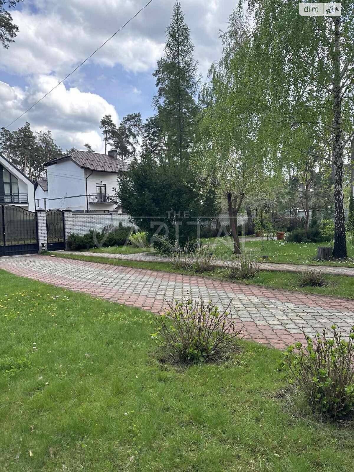 трехэтажный дом с верандой, 428.9 кв. м, кирпич. Продажа в Буче район Буча фото 1