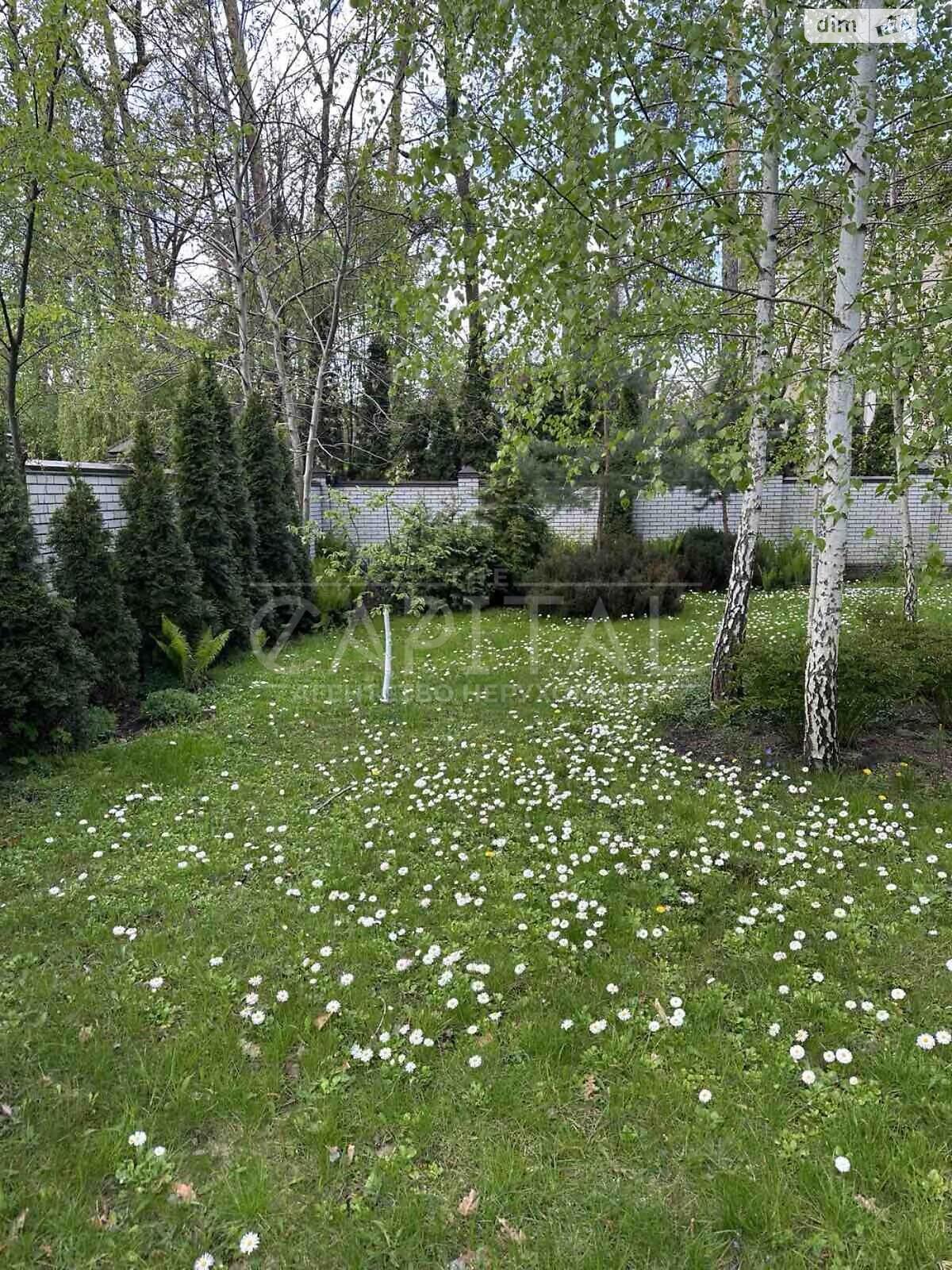 трехэтажный дом с верандой, 428.9 кв. м, кирпич. Продажа в Буче район Буча фото 1