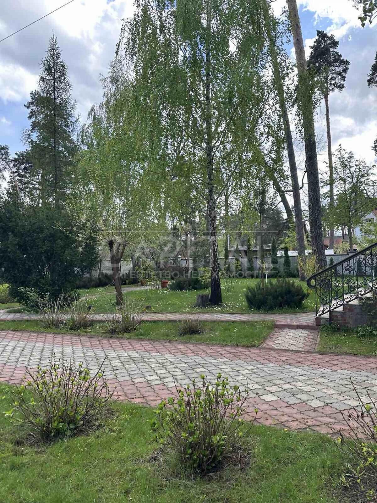 трехэтажный дом с верандой, 428.9 кв. м, кирпич. Продажа в Буче район Буча фото 1