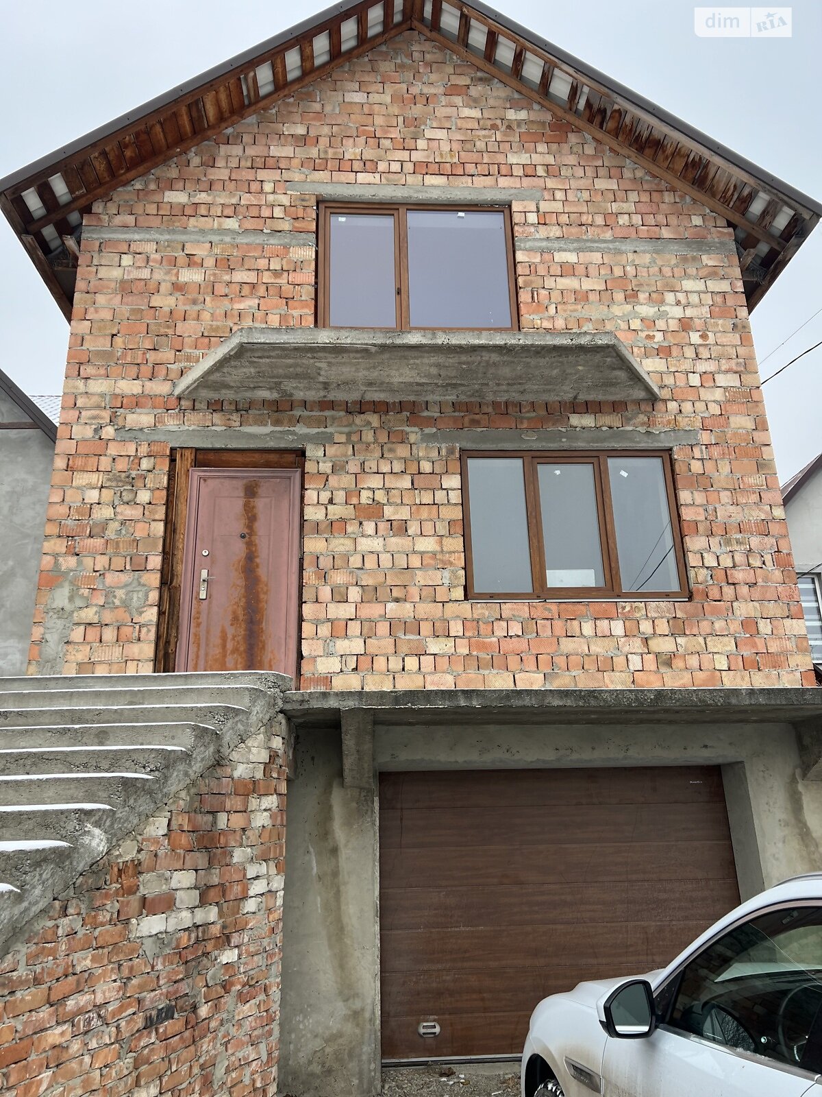 двухэтажный дом с гаражом, 180 кв. м, кирпич. Продажа в Черновцах фото 1