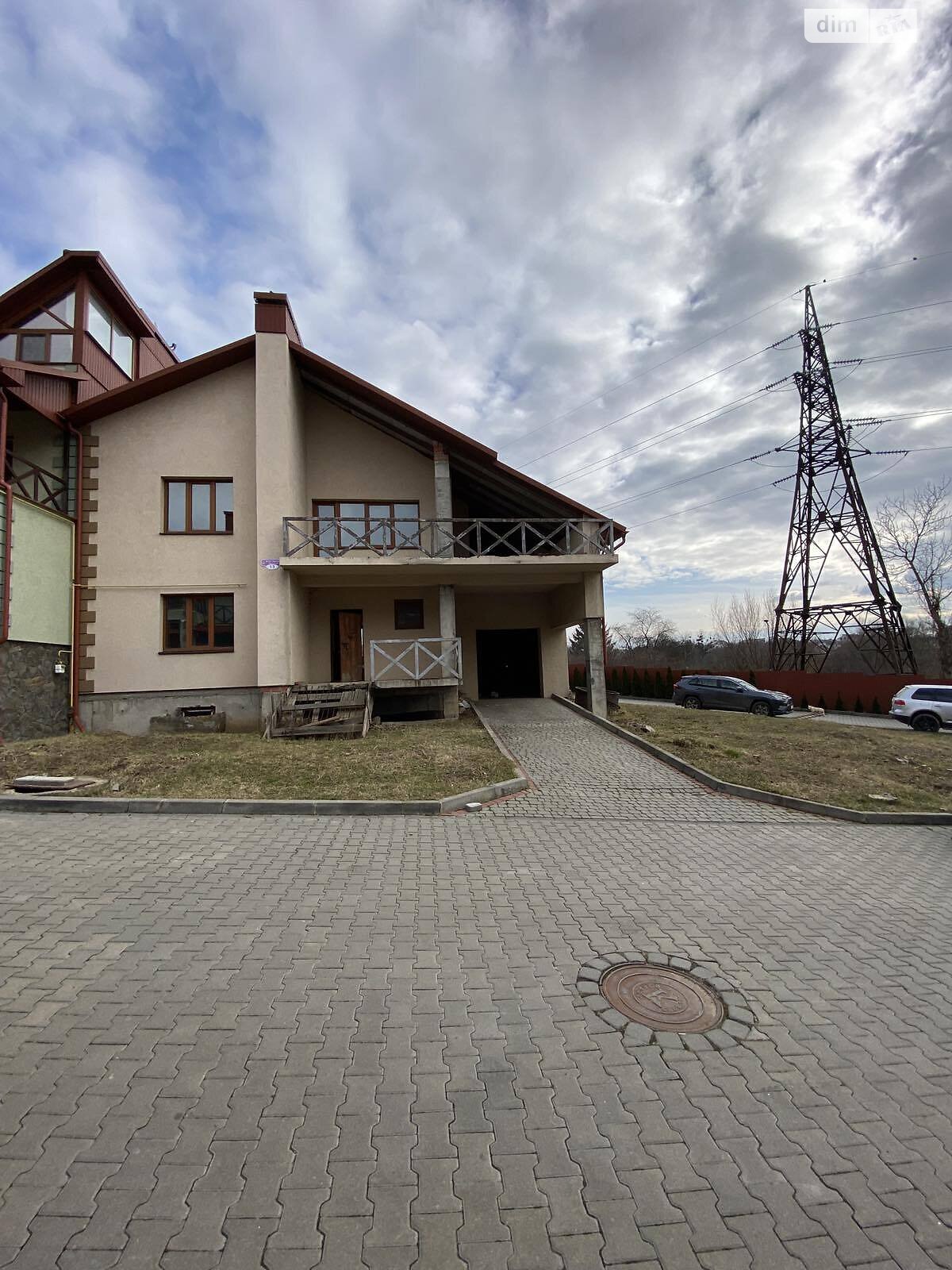 двухэтажный дом с гаражом, 200 кв. м, кирпич. Продажа в Черновцах фото 1