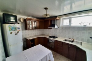одноэтажный дом с гаражом, 109 кв. м, кирпич. Продажа в Черткове район Центр фото 2