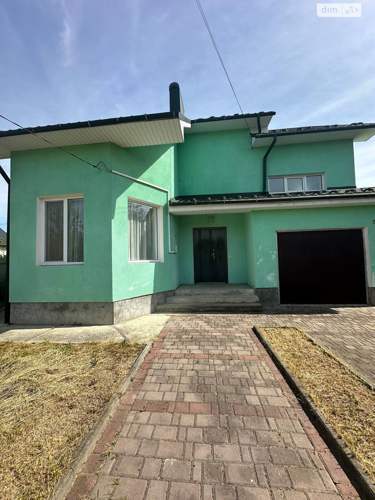 двухэтажный дом с гаражом, 175.6 кв. м, кирпич. Продажа в Чукаловке фото 1