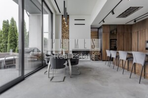 одноэтажный дом с гаражом, 280 кв. м, кирпич. Продажа в Дмитровке фото 2