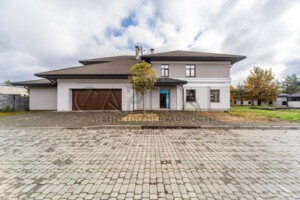 двухэтажный дом с гаражом, 550 кв. м, кирпич. Продажа в Дмитровке фото 2