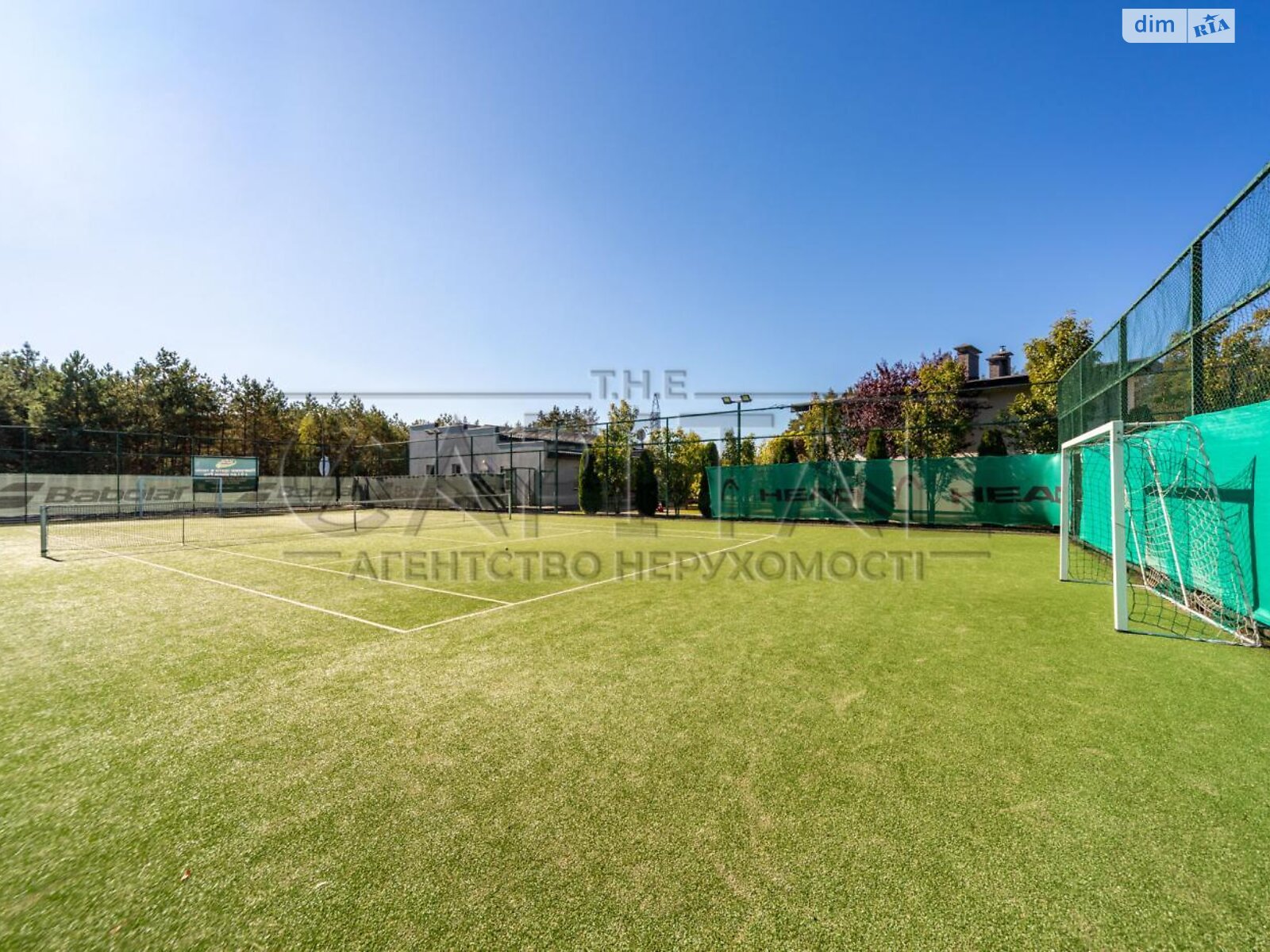 двухэтажный дом с гаражом, 550 кв. м, кирпич. Продажа в Дмитровке фото 1