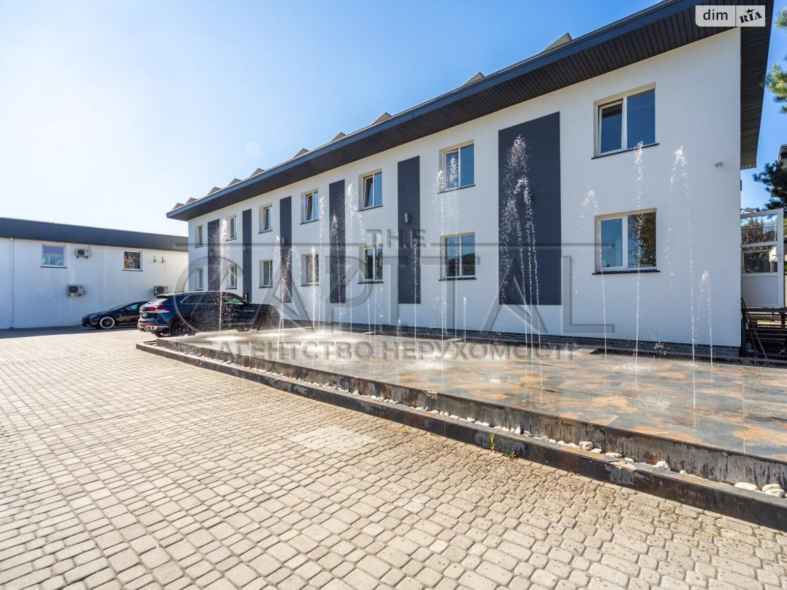 двухэтажный дом с гаражом, 550 кв. м, кирпич. Продажа в Дмитровке фото 1