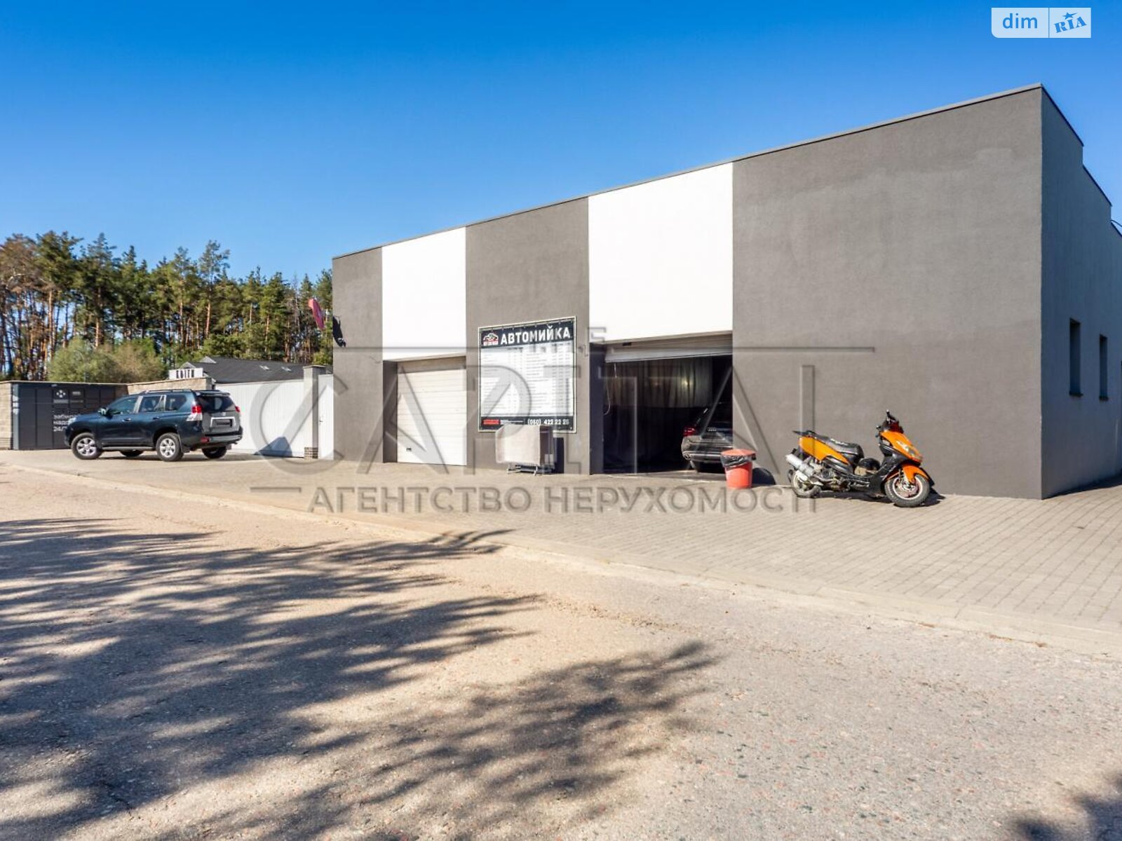 двухэтажный дом с гаражом, 550 кв. м, кирпич. Продажа в Дмитровке фото 1