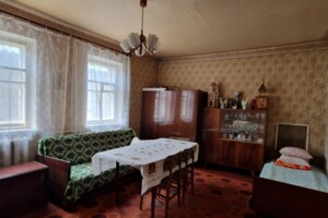 одноэтажный дом с гаражом, 59 кв. м, кирпич. Продажа в Старых Кодаках фото 2