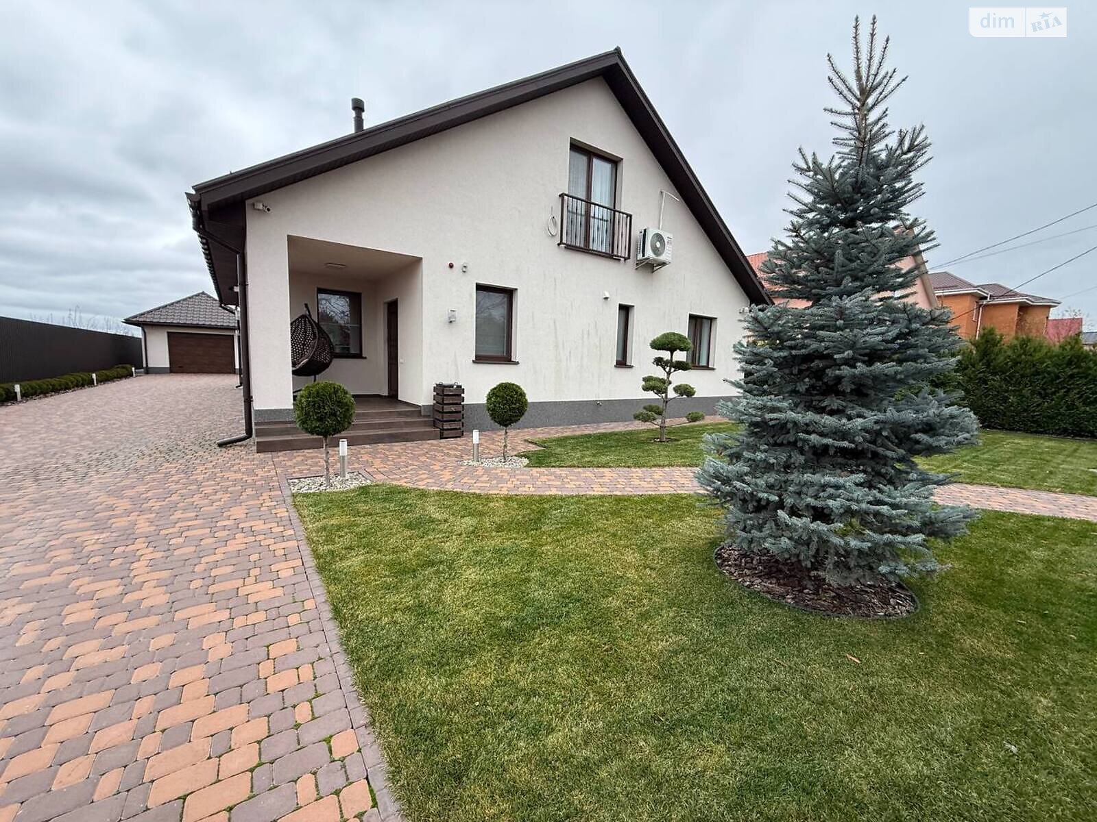 двухэтажный дом с гаражом, 204 кв. м, кирпич. Продажа в Фурсах фото 1