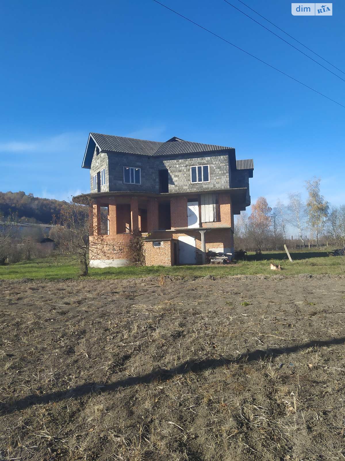 трехэтажный дом с верандой, 350 кв. м, кирпич. Продажа в Ганнусовке фото 1