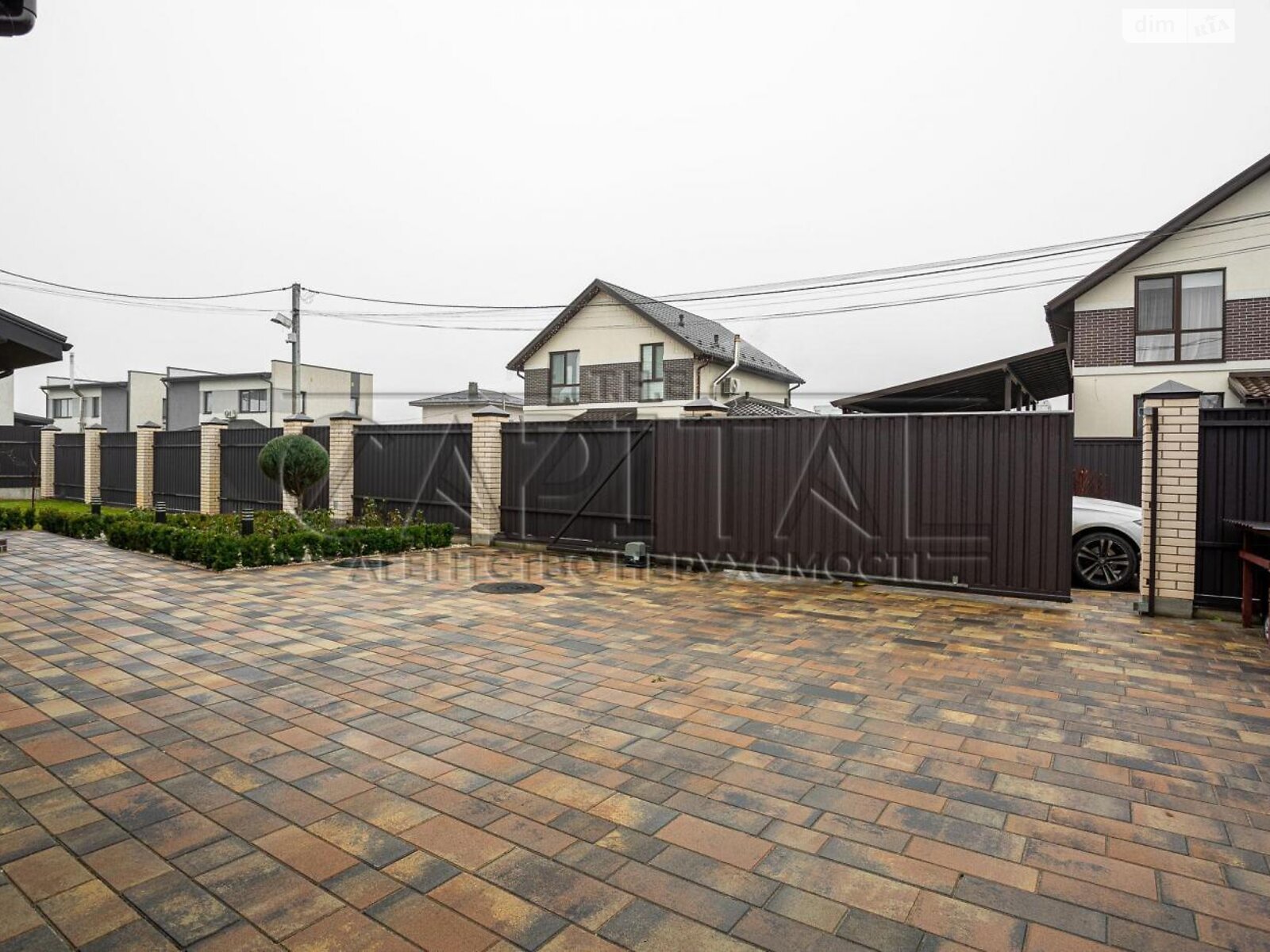 двухэтажный дом с гаражом, 250 кв. м, кирпич. Продажа в Гатном фото 1