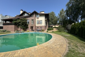 двухэтажный дом с верандой, 498 кв. м, кирпич. Продажа в Гореничах фото 2