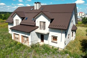 двухэтажный дом с гаражом, 367 кв. м, керамический блок. Продажа в Бартатовом фото 2