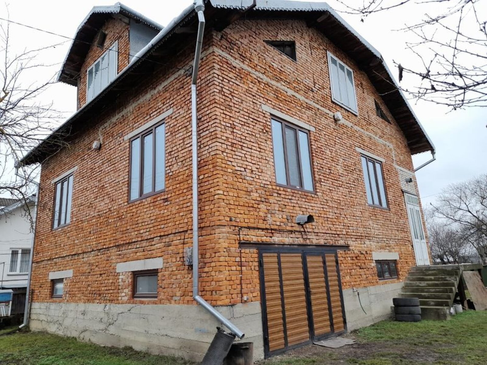 двоповерховий будинок з гаражем, 109 кв. м, кирпич. Продаж у Гринівці фото 1