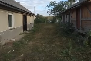 одноэтажный дом с отоплением, 84 кв. м, кирпич. Продажа в Грыцовцах фото 2