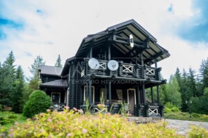 двухэтажный дом с отоплением, 370 кв. м, дерево и кирпич. Продажа в Гуте фото 2