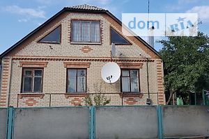 одноэтажный дом с гаражом, 127 кв. м, кирпич. Продажа в undefined (Харьковская обл.) фото 2