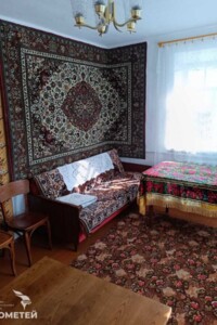 одноэтажный дом с гаражом, 70 кв. м, кирпич. Продажа в Хижинцах фото 2