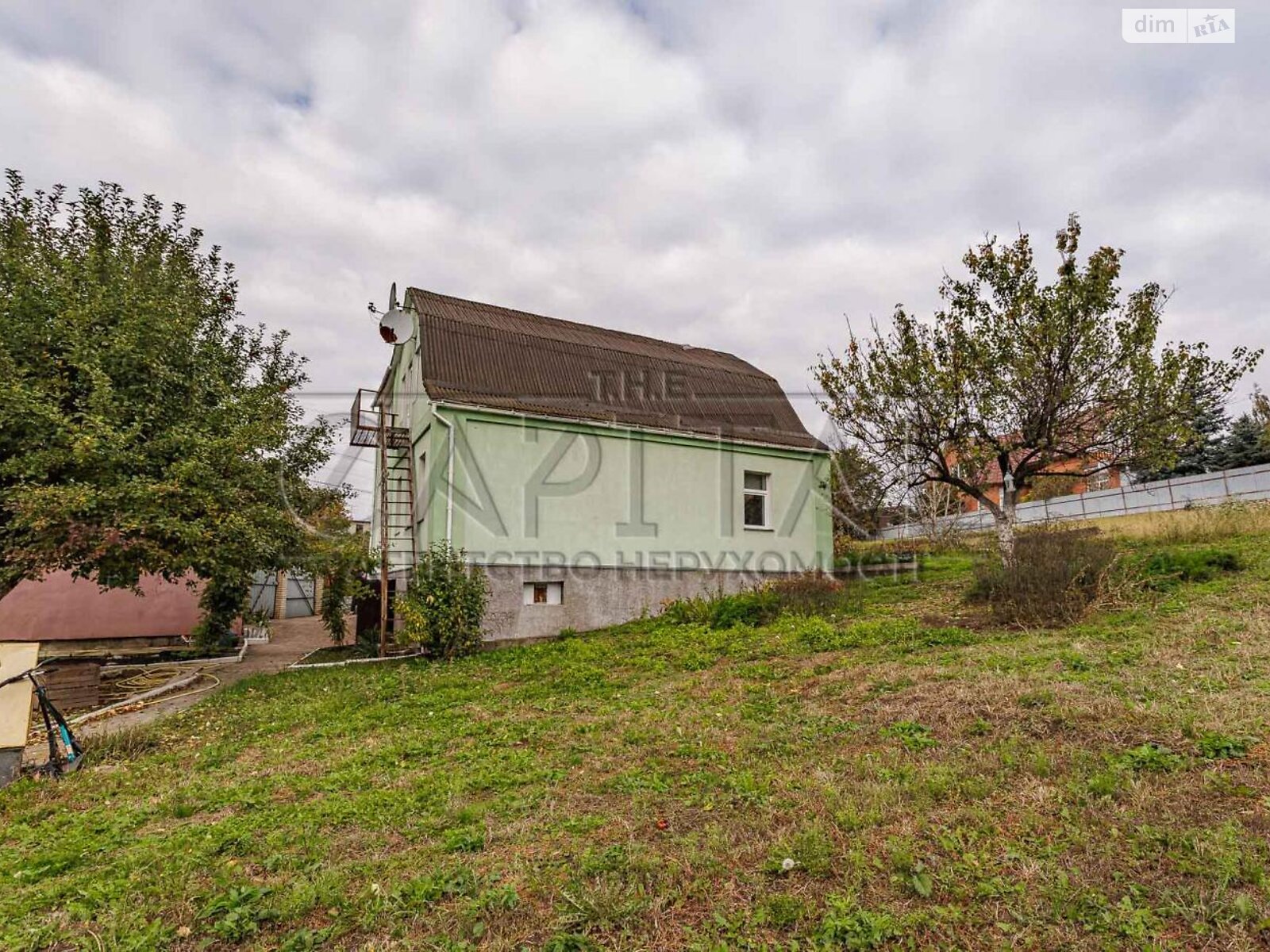 двухэтажный дом с гаражом, 140 кв. м, кирпич. Продажа в Хотове фото 1