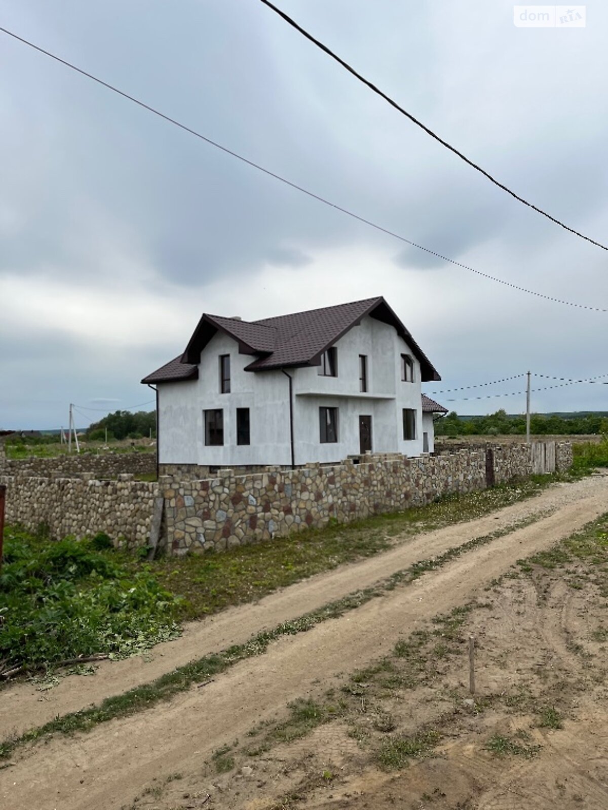 трехэтажный дом с гаражом, 265 кв. м, кирпич. Продажа в Криховцах фото 1