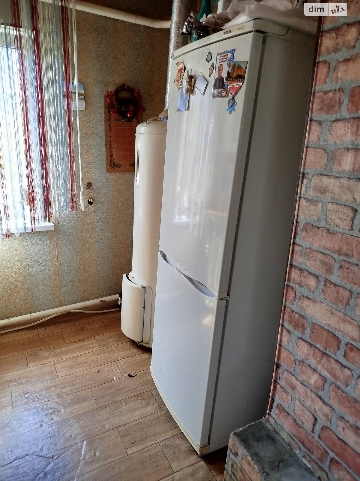 одноэтажный дом с гаражом, 58 кв. м, дерево и кирпич. Продажа в Изюме фото 1 одноэтажный дом с гаражом, 58 кв. м, дерево и кирпич. Продажа в Изюме фото 1