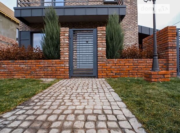 двоповерховий будинок з терасою, 230 кв. м, цегла. Продаж в Жулянах (Київська обл.) фото 1 двоповерховий будинок з терасою, 230 кв. м, цегла. Продаж в Жулянах (Київська обл.) фото 1