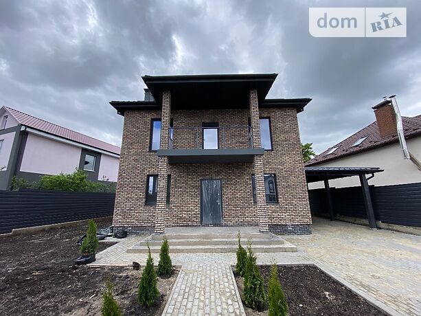 двоповерховий будинок з опаленням, 206 кв. м, цегла. Продаж в Жулянах (Київська обл.) фото 1 двоповерховий будинок з опаленням, 206 кв. м, цегла. Продаж в Жулянах (Київська обл.) фото 1