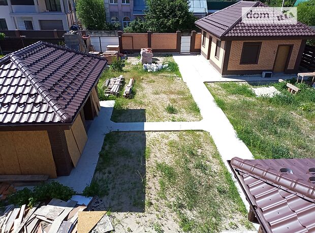 трехэтажный дом с гаражом, 350 кв. м, кирпич. Продажа в Киеве район Оболонский фото 1 трехэтажный дом с гаражом, 350 кв. м, кирпич. Продажа в Киеве район Оболонский фото 1