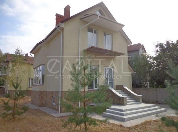 трехэтажный дом с гаражом, 245 кв. м, кирпич. Продажа в Чайках (Киевская обл.) фото 1