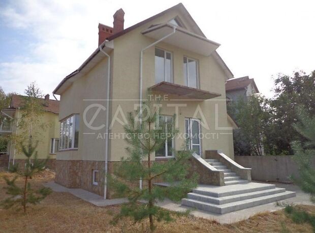 трехэтажный дом с гаражом, 245 кв. м, кирпич. Продажа в Чайках (Киевская обл.) фото 1 трехэтажный дом с гаражом, 245 кв. м, кирпич. Продажа в Чайках (Киевская обл.) фото 1