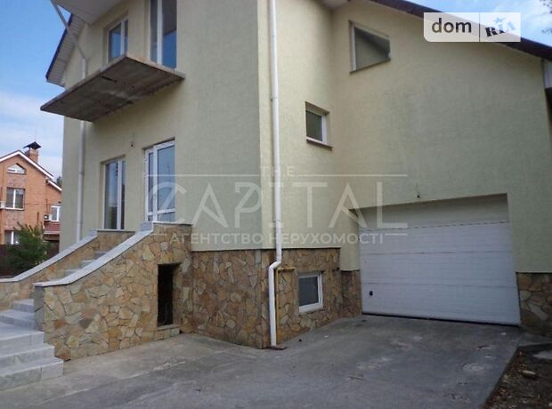 трехэтажный дом с гаражом, 245 кв. м, кирпич. Продажа в Чайках (Киевская обл.) фото 1 трехэтажный дом с гаражом, 245 кв. м, кирпич. Продажа в Чайках (Киевская обл.) фото 1