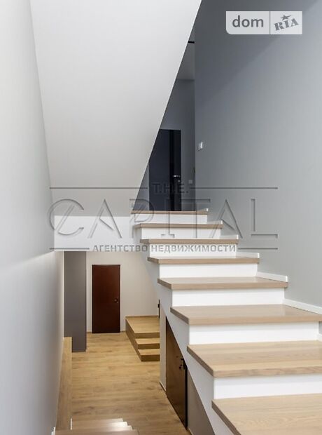 трехэтажный дом с камином, 230 кв. м, кирпич. Продажа в Чайках (Киевская обл.) фото 1 трехэтажный дом с камином, 230 кв. м, кирпич. Продажа в Чайках (Киевская обл.) фото 1