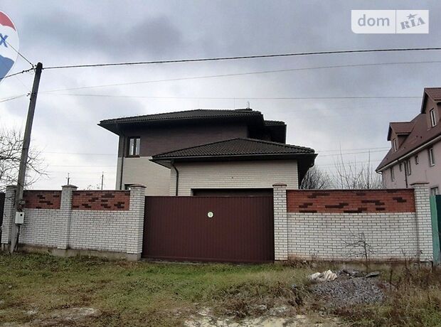 двухэтажный дом с садом, 239 кв. м, кирпич. Продажа в Хотове (Киевская обл.) фото 1