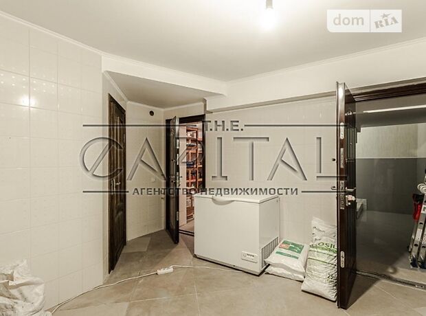 трехэтажный дом с садом, 290 кв. м, кирпич. Продажа в Хотове (Киевская обл.) фото 1 трехэтажный дом с садом, 290 кв. м, кирпич. Продажа в Хотове (Киевская обл.) фото 1
