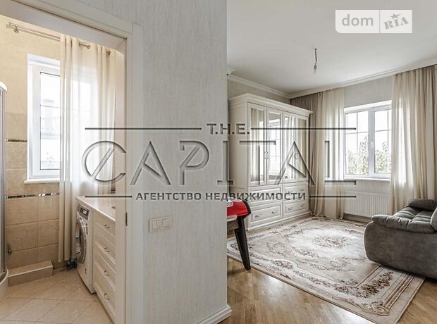 трехэтажный дом с садом, 290 кв. м, кирпич. Продажа в Хотове (Киевская обл.) фото 1 трехэтажный дом с садом, 290 кв. м, кирпич. Продажа в Хотове (Киевская обл.) фото 1