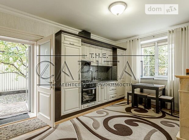 трехэтажный дом с садом, 290 кв. м, кирпич. Продажа в Хотове (Киевская обл.) фото 1 трехэтажный дом с садом, 290 кв. м, кирпич. Продажа в Хотове (Киевская обл.) фото 1
