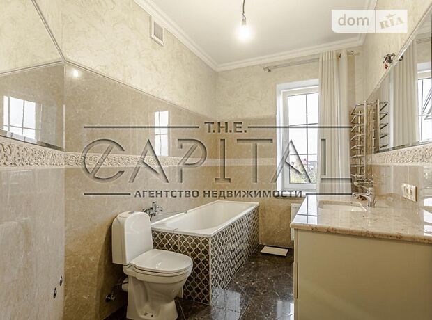 трехэтажный дом с садом, 290 кв. м, кирпич. Продажа в Хотове (Киевская обл.) фото 1 трехэтажный дом с садом, 290 кв. м, кирпич. Продажа в Хотове (Киевская обл.) фото 1