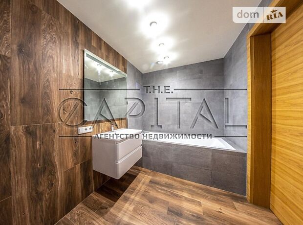 трехэтажный дом с террасой, 227 кв. м, кирпич. Продажа в Крюковщине (Киевская обл.) фото 1 трехэтажный дом с террасой, 227 кв. м, кирпич. Продажа в Крюковщине (Киевская обл.) фото 1