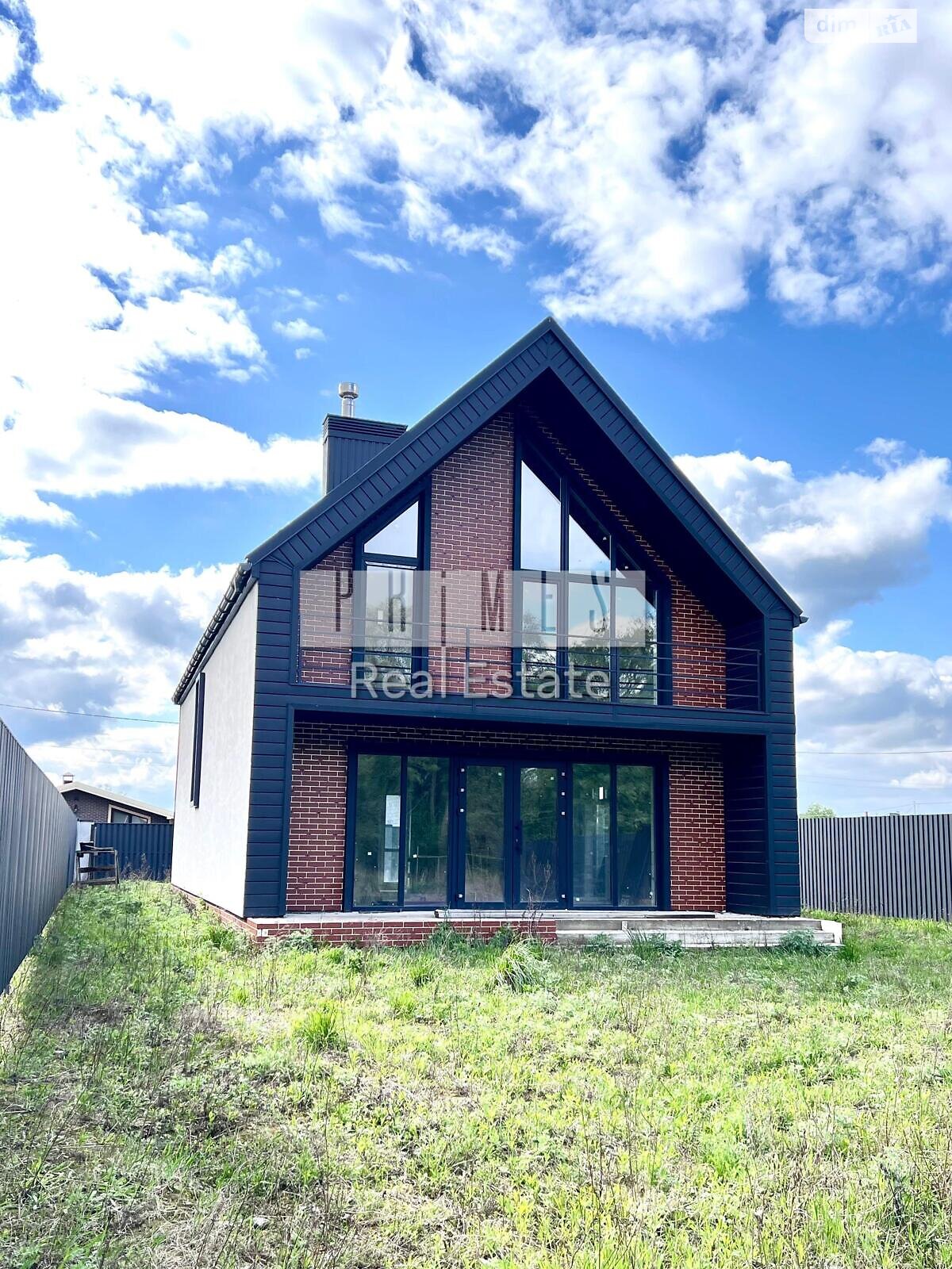 двухэтажный дом с верандой, 160 кв. м, кирпич. Продажа в Княжичах фото 1