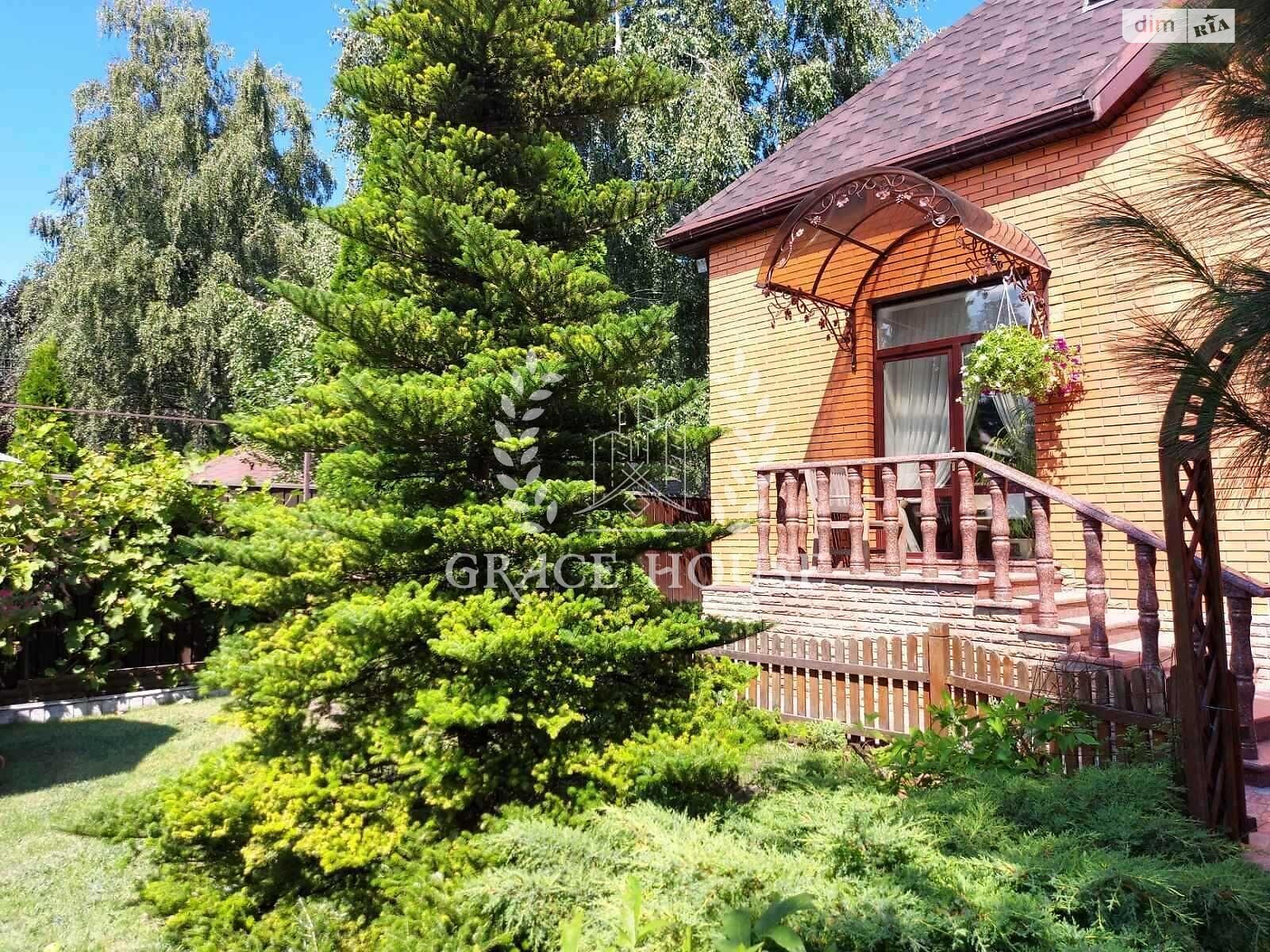 триповерховий будинок з гаражем, 446 кв. м, цегла. Продаж у Козині фото 1