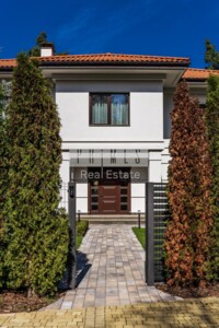 двухэтажный дом с гаражом, 530 кв. м, кирпич. Продажа в Козине фото 2