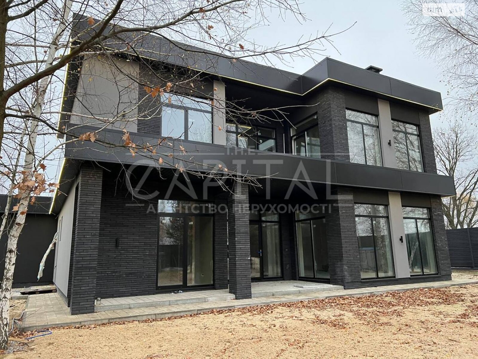 двоповерховий будинок з гаражем, 300 кв. м, цегла. Продаж у Козині фото 1 двоповерховий будинок з гаражем, 300 кв. м, цегла. Продаж у Козині фото 1