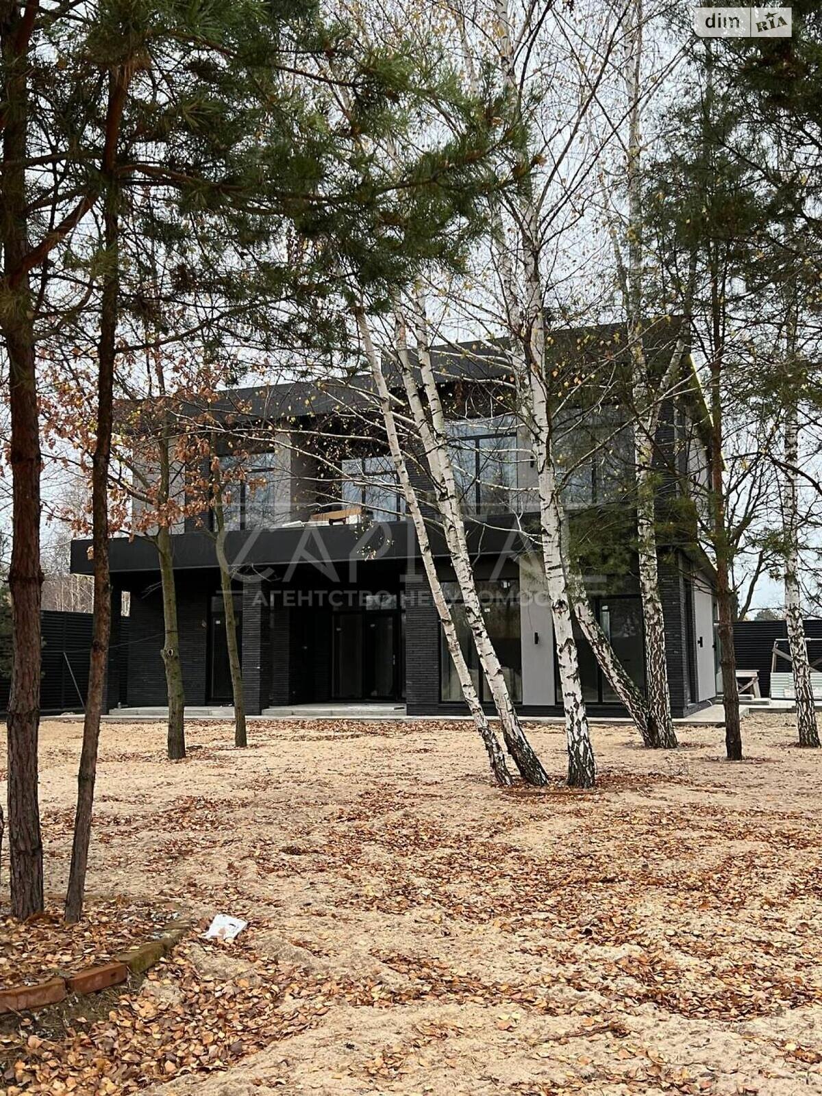двоповерховий будинок з гаражем, 300 кв. м, цегла. Продаж у Козині фото 1 двоповерховий будинок з гаражем, 300 кв. м, цегла. Продаж у Козині фото 1