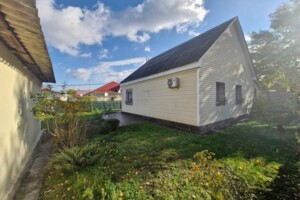 одноэтажный дом с гаражом, 82.7 кв. м, кирпич. Продажа в Кременчуге район Крюков фото 2