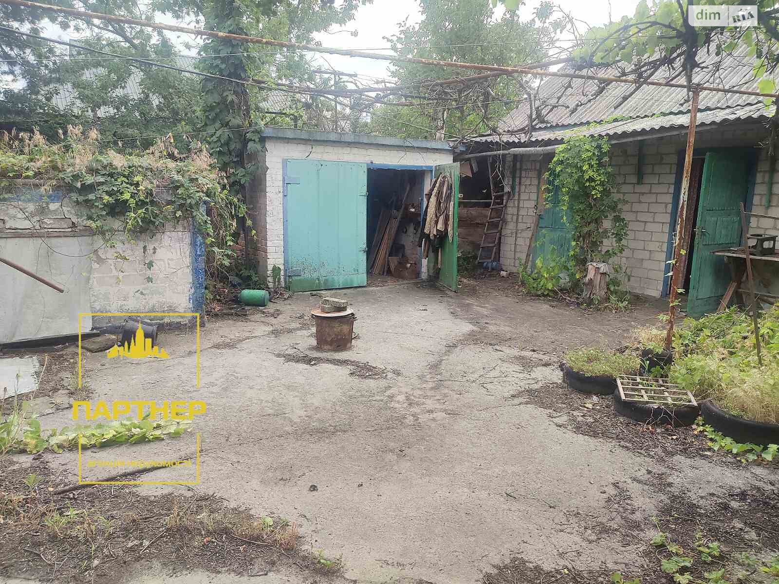 одноэтажный дом с гаражом, 65 кв. м, кирпич. Продажа в Кременчуге район Крюковский фото 1 одноэтажный дом с гаражом, 65 кв. м, кирпич. Продажа в Кременчуге район Крюковский фото 1