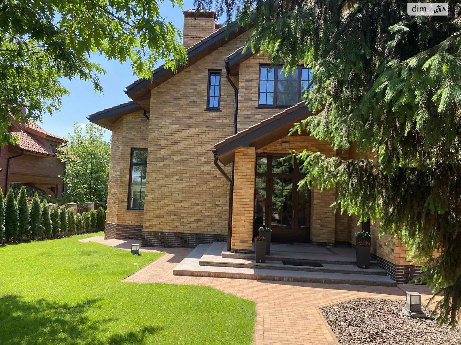 двоповерховий будинок з гаражем, 460 кв. м, цегла. Продаж у Лісниках фото 1