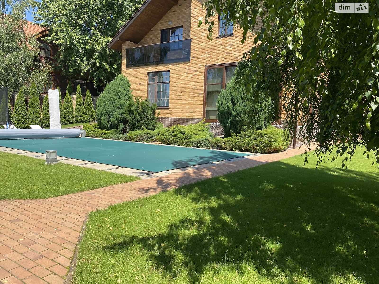 двоповерховий будинок з гаражем, 460 кв. м, цегла. Продаж у Лісниках фото 1