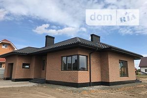 одноэтажный дом с гаражом, 180 кв. м, кирпич. Продажа в Рованцах фото 2